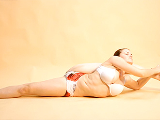 Busty gymnast in sexy yoga video